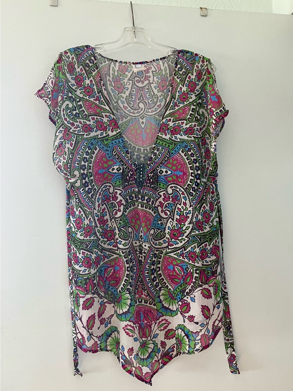 Becca Beach Cover-Up; Some Corrosion on Decorative Charm